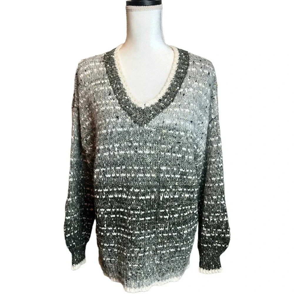 GEEGEE woman’s v-neck,‎ knit sweater. 
Size: Medium 
back